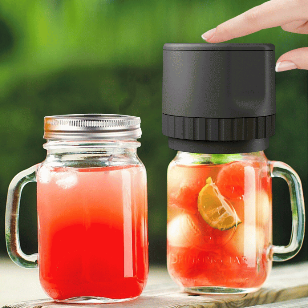 Sealing fresh juices with black electric vacuum jar sealer for leak-proof storage