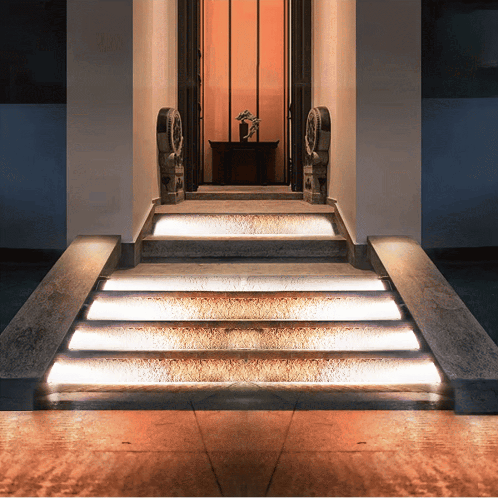 Illuminated stairs showcasing the bright output of LED Stair Step Lamps