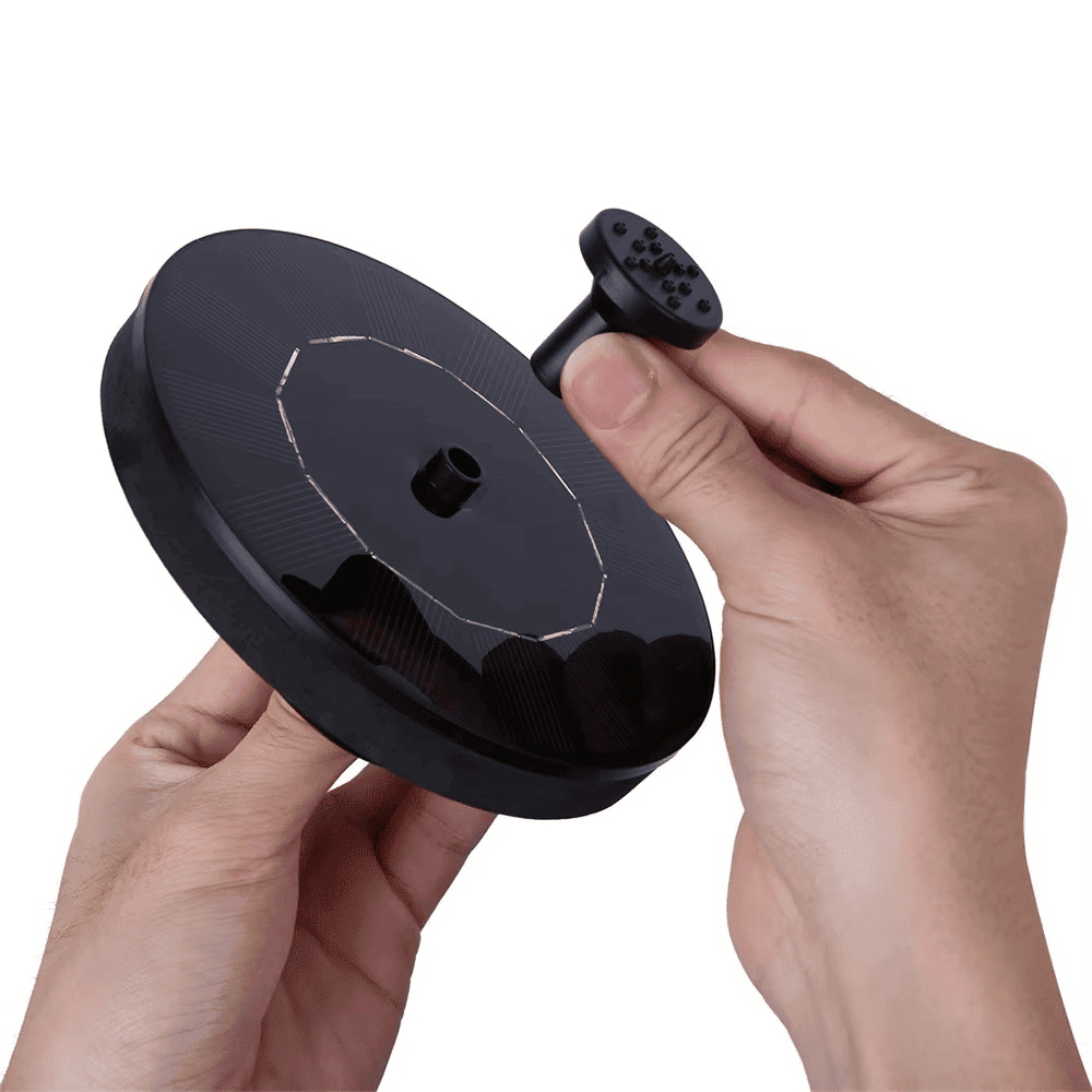 Hands assembling Solar Fountain Pump nozzle, showcasing tool-free setup and portability