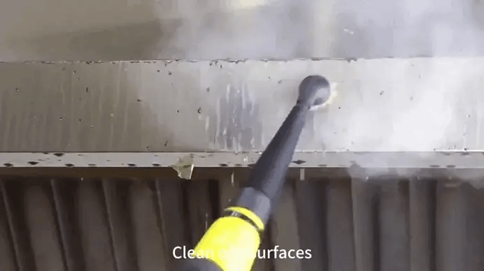 Steam cleaner nozzle removing grime from ceiling showcasing multi-surface performance