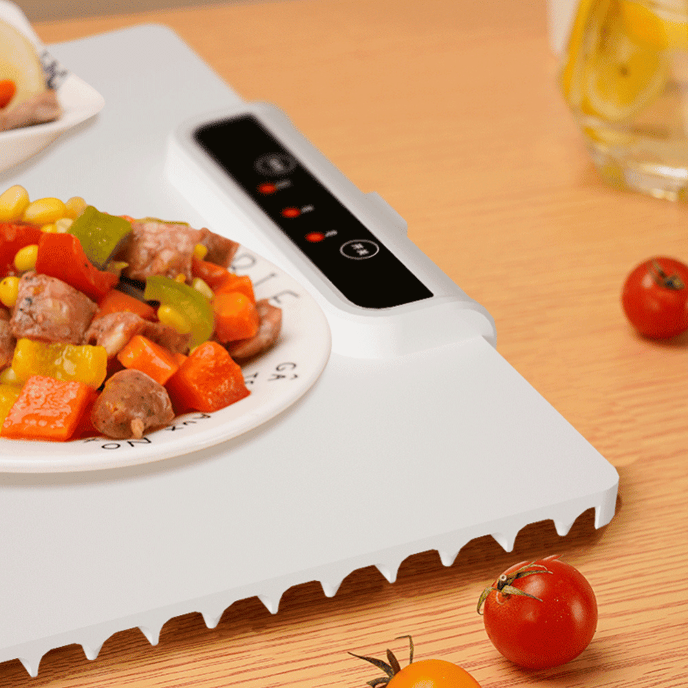 Close-up of foldable food warmer’s digital display and textured edge design for heat distribution.