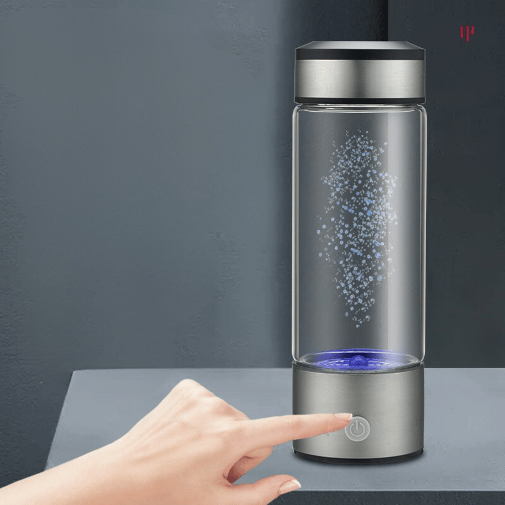 Hydrogen water generator in use with one-touch activation on a dark background